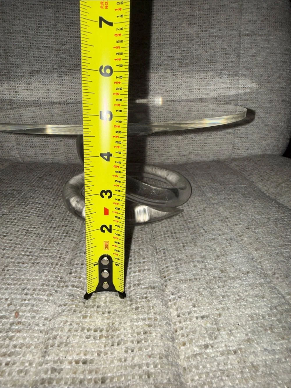 Vintage Lucite Cake Stand with a spiral loop base. Great condition for age.